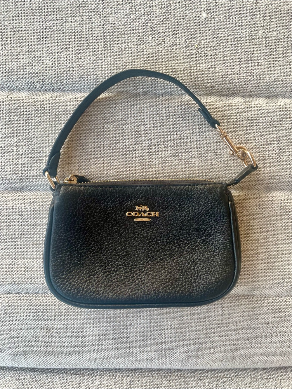 Coach Nolita Black Pebbled Leather Mini Wristlet with Gold Logo